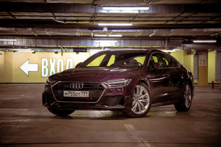 Moscow. Russia - January 16, 2020: Audi A7 Sportback Ultra Nova GT 1 of 111 A purple-colored premium car stands in the parking lot.  Front viewのeditorial素材