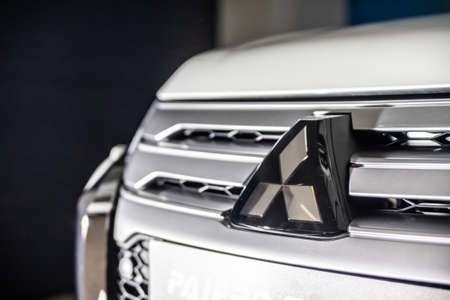 Moscow, Russia - February 17, 2021: All new Mitsubishi Pajero Sport. Montero. Car stand at the parking box, dark light.のeditorial素材