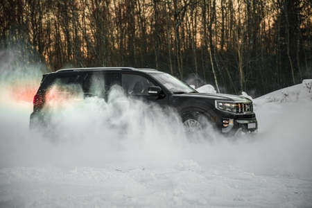 Moscow, Russia - February 17, 2021: All new Mitsubishi Pajero Sport. Facelifted suv. winter, the car is tested at the test site the front of the updated SUV. Front and half viewのeditorial素材