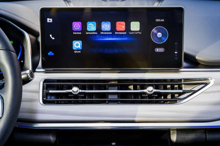 Moscow, Russia - March 19, 2021: Chery Tiggo 8 Pro \ Plus Interior of premium china suv, dashboard and steering wheel, screen and climateのeditorial素材