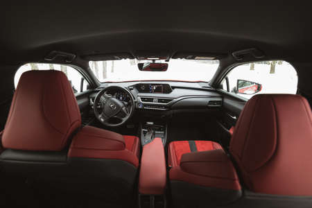 Russia, Moscow - February 05, 2020: Leather Interior of Red premium crossover hatchback Lexus UX 250h hubridのeditorial素材