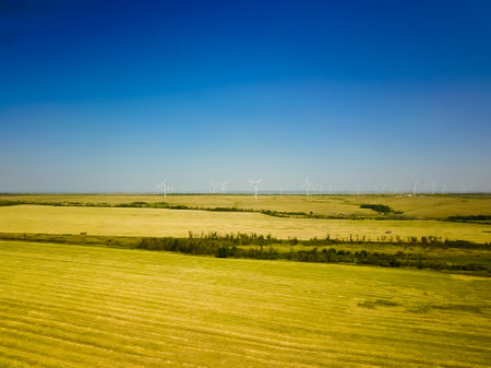 Renewable green energy, wind energy with windmills or wind turbineの写真素材