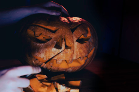 The process of carving a Halloween pumpkin.の写真素材