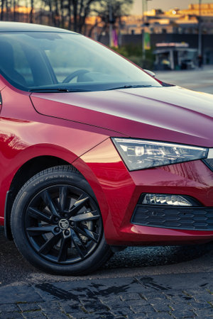 MOSCOW, RUSSIA - OCTOBER 10, 2022: Red Skoda Rapid 22 parked on the street verticalのeditorial素材