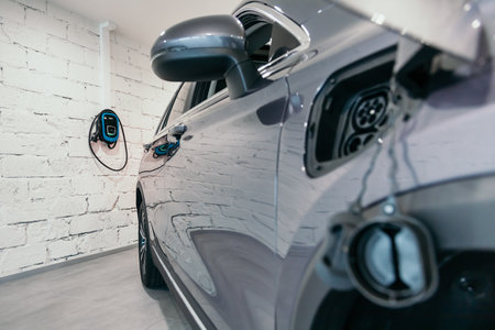 Charging station of a modern electric car. The back of the electric crossoverの写真素材