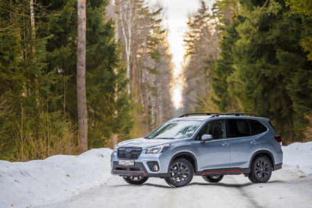 Kostroma, Russia - November 8, 2022: A silver Subaru Forester stands on the road in a snowy winter forestのeditorial素材
