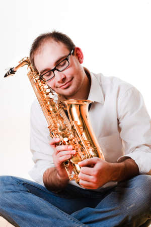 portrait of a man with a saxophoneの写真素材