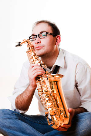 portrait of a man with a saxophoneの写真素材