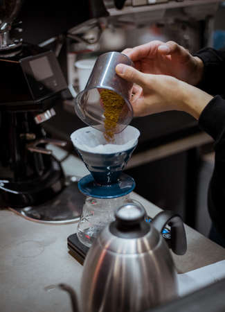 Drip brewing, filtered coffee, or pour-over is a method which involves pouring water over roastedの写真素材