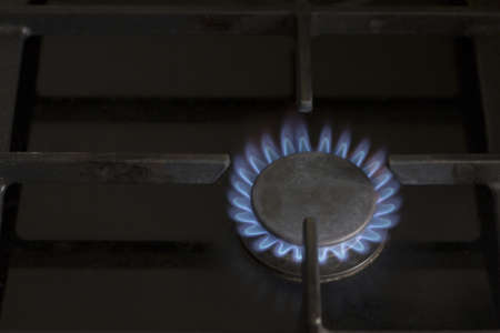 Burning flame of a gas stoveの写真素材