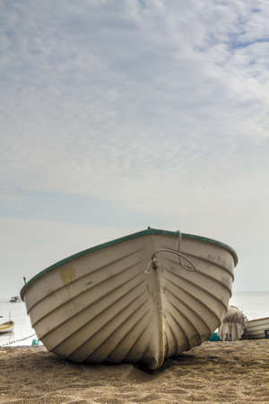 Fishing boat on the beachの写真素材