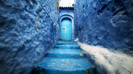 Fully blue alley with steps between the walls of houses, with blue doors at the end