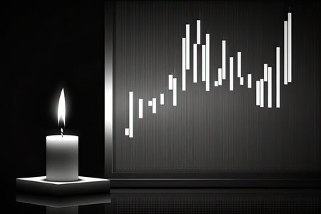 Candle and candlestick on the black backgroundの素材