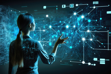 Young woman in suit touching icon of media screenの素材