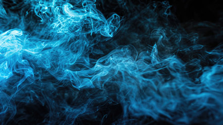 Blue colored smoke abstract lighting on a black background. Background from the smoke of vapeの素材