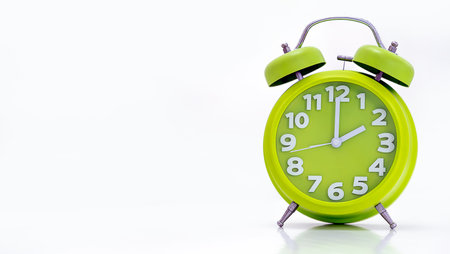 alarm clock isolated on a white backgroundの写真素材