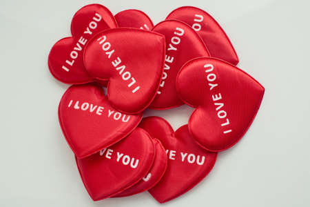 red heart with the word love you on white background
