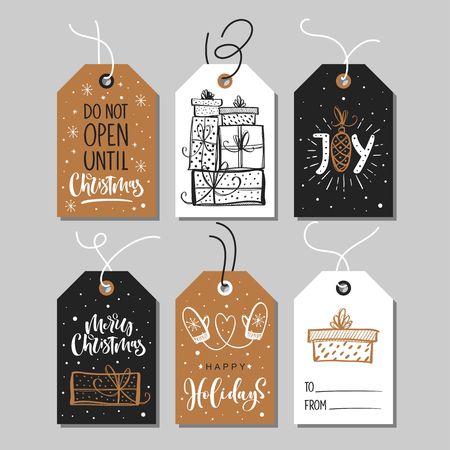 Christmas gift tags set with handwritten calligraphy and decorative elements.のイラスト素材