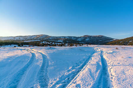 Beautiful winter mountain landscape with branching roads. Russia, Stary Krym.の写真素材