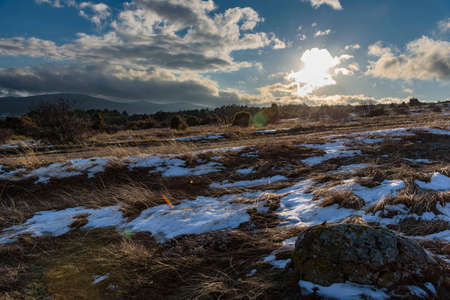 blue cloudy sky winter landscape, stoneの写真素材
