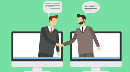 The conclusion of the transaction online. Two businessmen shake hands on a background of computer...