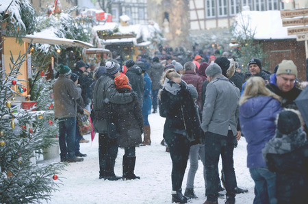 NIEDERSTETTEN, BADEN WURTTEMBERG, GERMANY - December 10 2017: Traditional Christmas Market. People on the Street, Christmas Trees and Kiosks.のeditorial素材