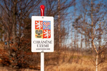 Czech Republic, Golden Mountains, October 2019. Information sign wit text in Czech Chranene uzemi...
