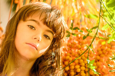 Portrait of a beautiful seven year old girlの写真素材