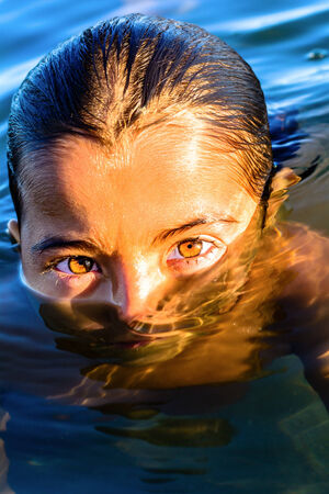 Beautiful eyes of a seven year old girlの写真素材