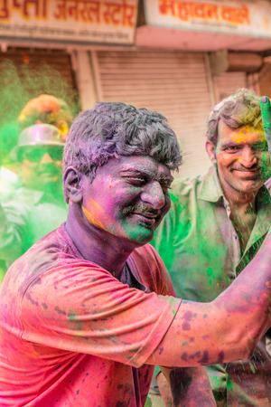 New Delhi India  March 6 2015:Men with a painted face celebrating Holi festival in Indiaのeditorial素材