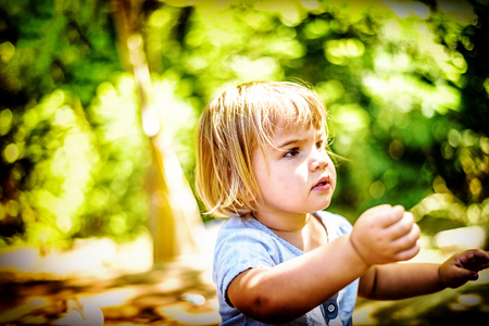 Portrait of a beautifull two year old  girl with blonde hairの写真素材