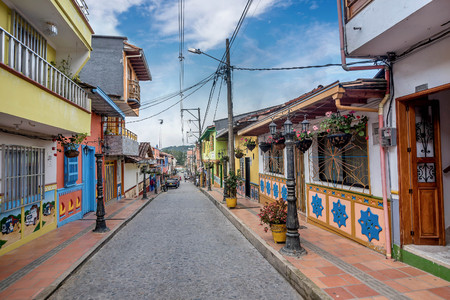 Brightly colored street in Guatape, Colombiaのeditorial素材