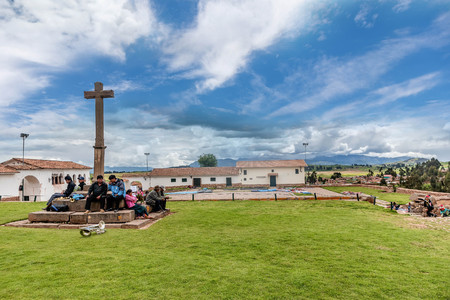 Cusco, Peru march 14, 2017: People sitting by the Cross StatueCusco, Peruのeditorial素材