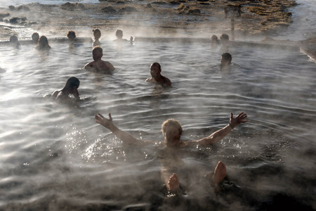 Tourist take a bath in hot springs at natural reserve Eduardo Avoroa, Boliviaのeditorial素材