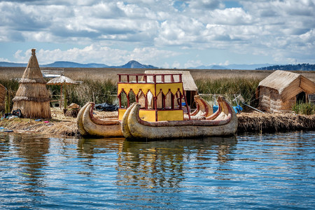Weathered reed boats along the coast of Lake Titicaca in Puno, Peruのeditorial素材