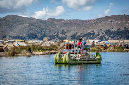 Weathered reed boats along the coast of Lake Titicaca in Puno, Peruのeditorial素材