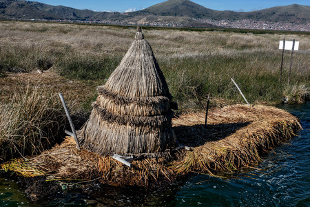 Hut made from reed on a floating island neer Puno, Peruの写真素材