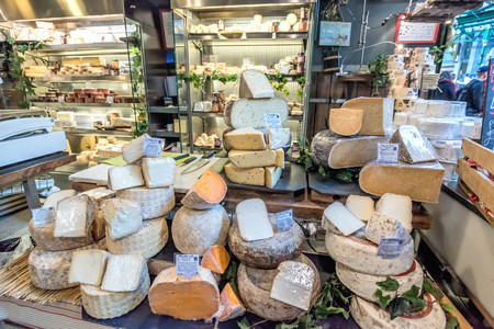 London, UK- January 10, 2018:Cheese selling  at Borough Market in London, United Kingdomのeditorial素材