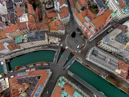City center of Ljubljana with the river Ljubljanica and the triple bridge Tromostovje, Sloveniaの写真素材