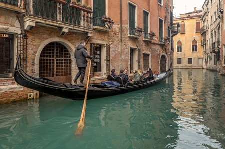 Venice, Italy- January 20, 2019: Beautiful view of traditional Gondolas with tourist on famous Canal Grande in Venice, Italyのeditorial素材