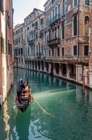 Venice, Italy- January 20, 2019: Beautiful view of traditional Gondolas with tourist on famous Canal Grande in Venice, Italyのeditorial素材