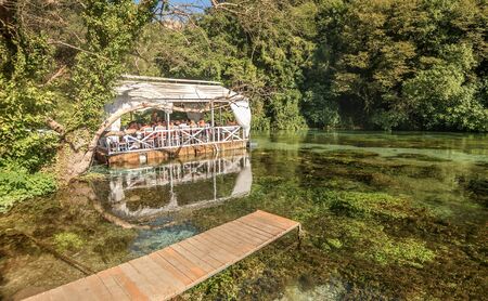 Muzine, Albania- August 8, 2019: Restaurant at Blue Eye spring of the river Bistrica near Muzine, Albaniaのeditorial素材