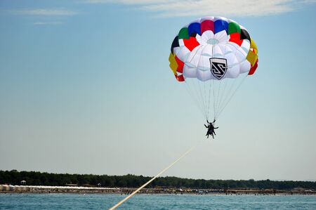 Ulcinj, Montenegro- July 5, 2019:Parasailing on the Adriatic coast of Montenegroのeditorial素材