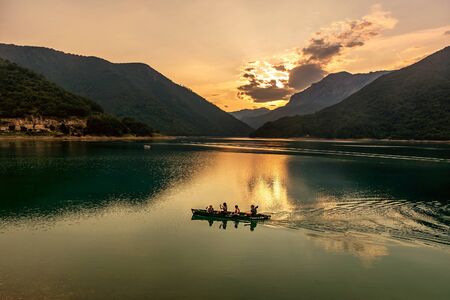 Pluzine, Montenegro- July 22, 2019: Beautiful view of Piva lake at sundown, Montenegro