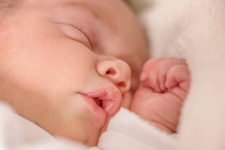 Beautiful Newborn infant baby boy sleeping