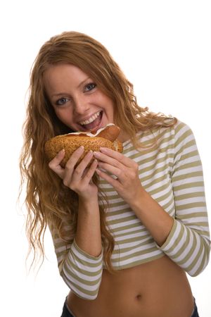 girl eating hot dogの写真素材