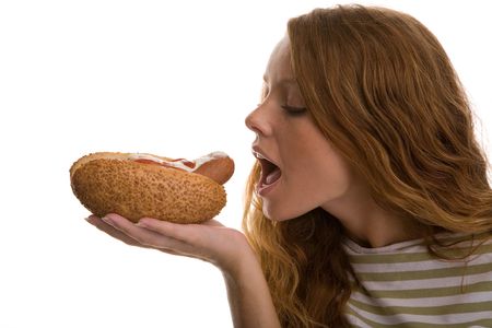 girl eating hot dogの写真素材