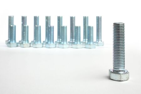 brilliant bolts of various sizes on a white backgroundの写真素材