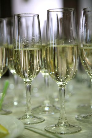 many glasses of champagne on the tableの写真素材