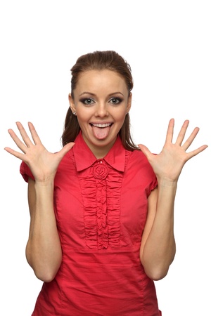 cute redhead girl teasing showing tongueの写真素材